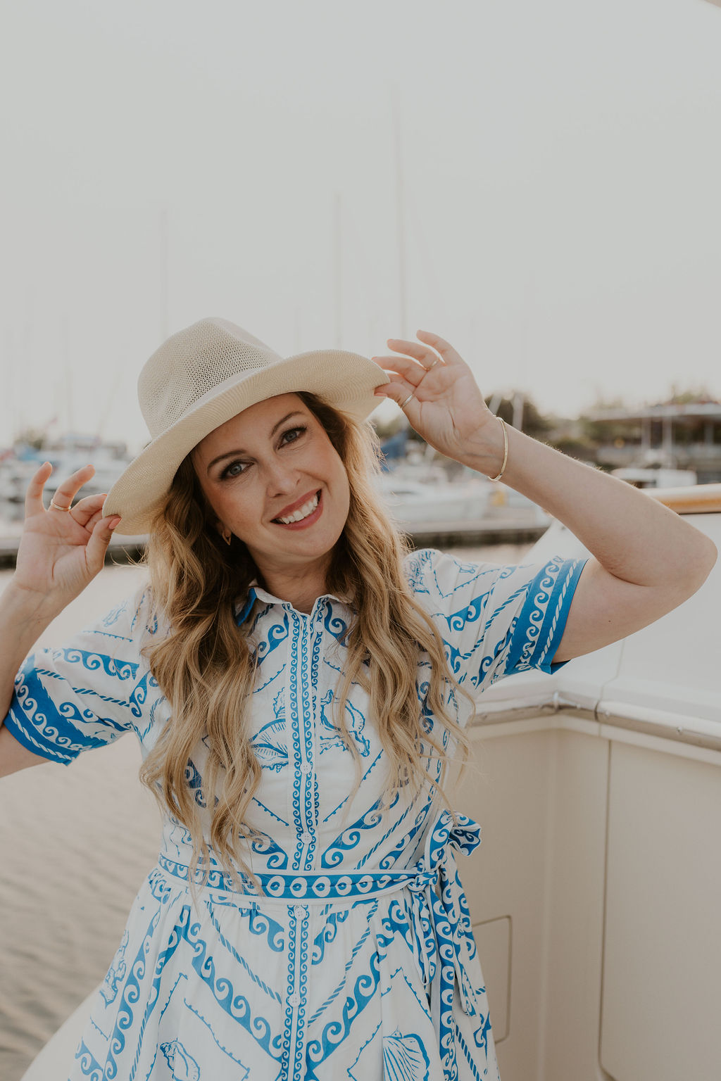 Brandi Coplen, Whatcom County Realtor, smiling at the marina