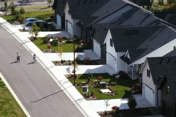 Wide sidewalks and new homes along a street at The Ridge at Harbor Hills in Blaine, WA